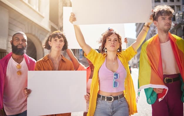 A medium shot of a group of protesters holding signs with slogans related to fair taxes and economic justice. The signs are colorful and eye-catching. The background shows a government building.