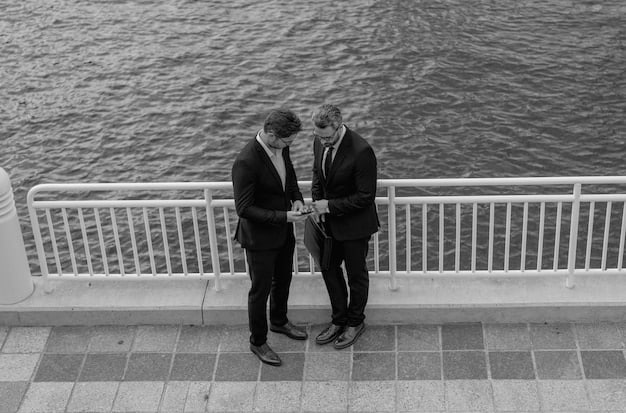 A black and white photograph of President Reagan and Mikhail Gorbachev signing the INF Treaty. The image shows them smiling and shaking hands, symbolizing a moment of successful Cold War diplomacy.